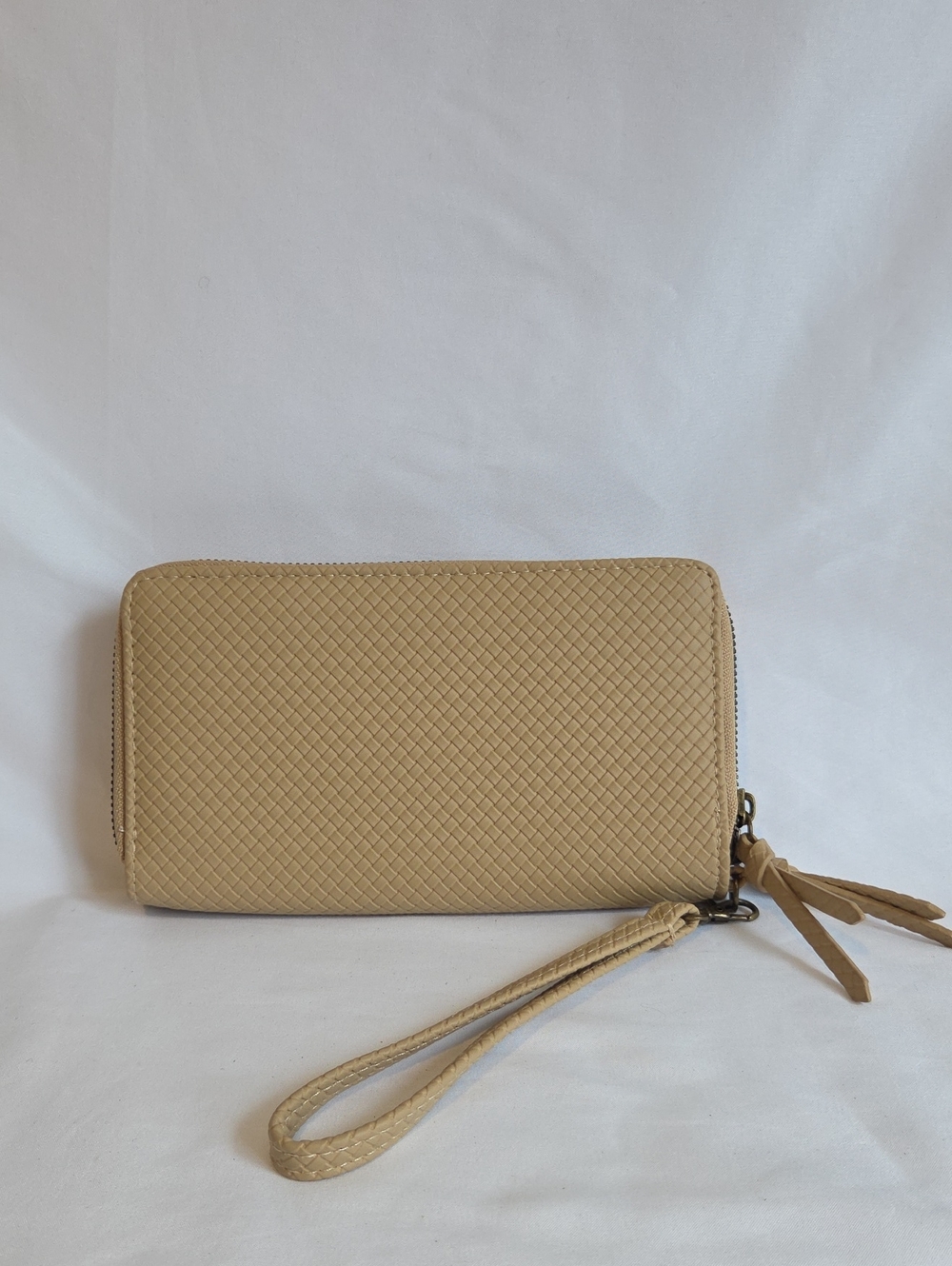 Safe Keeper Beige Textured Woven Zip Around Wristlet Wallet.